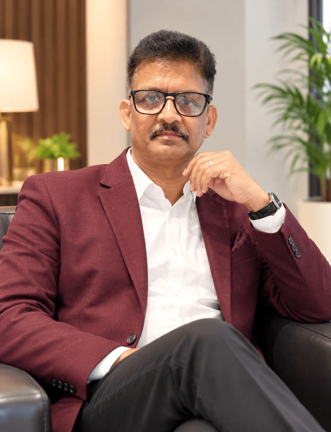 Future Vending founder Ganesh Parida seated in a burgundy blazer